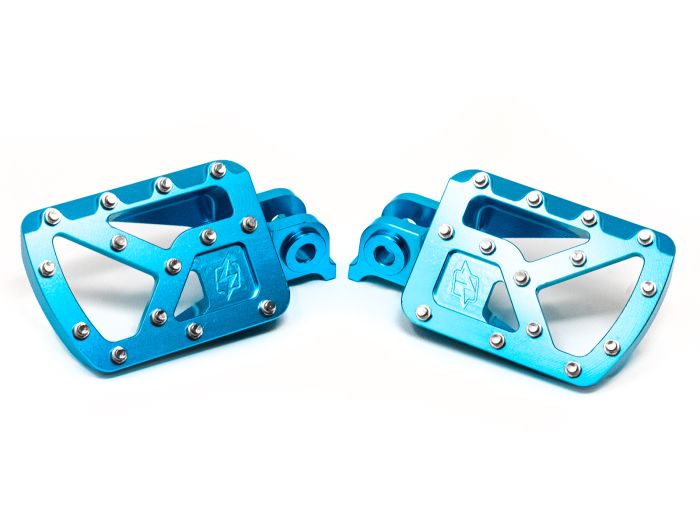 megalith_footpegs_blue_1_1a2a530c-6850-450d-8f86-48dd92a254c9 - Surron Off Road USA